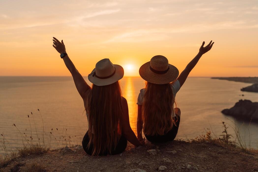 Friends watching the sunset together